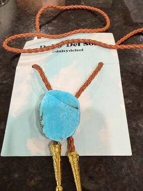 Daisy Turquoise Stone Bolo Necklace with Brown Cord and Gold Tips